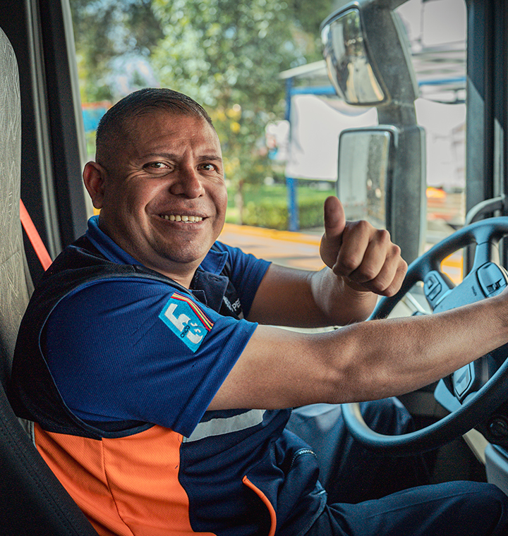 Man sitting behind the wheel of a vehicle